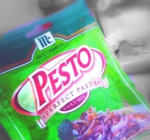 Add McCormick’s Pesto mix and water